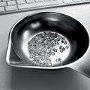 Black-and-white close-up of natural Old Mine cut diamonds, approximately 0.40 carat each, in a diamond scale dish with a keyboard softly visible in the background.
